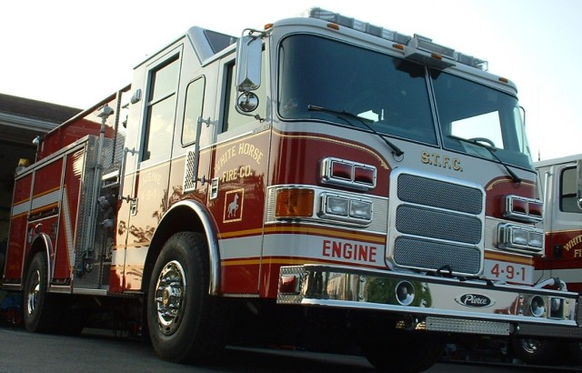 The early morning sunrise reflects off of Engine 4-9-1... May 2005